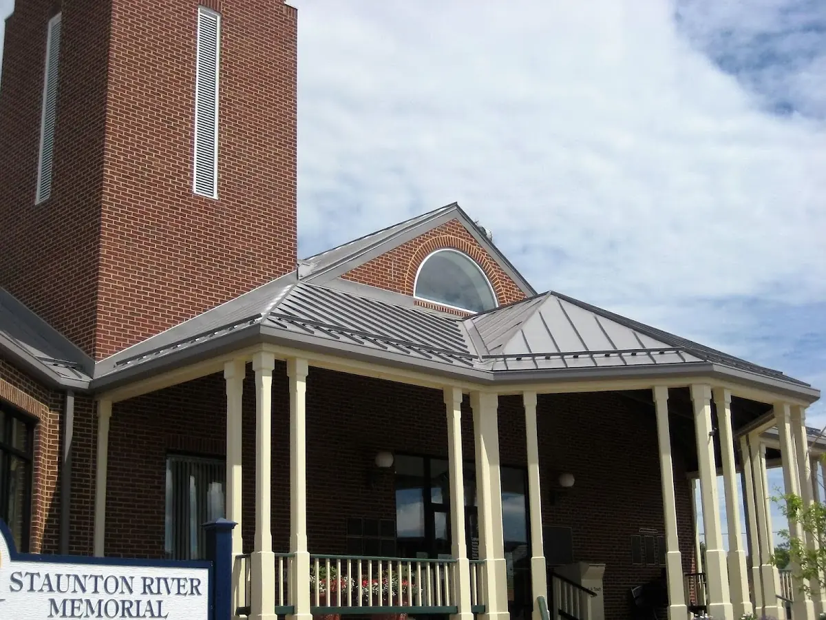 Skilled roofing craftsmen working on a residential roof in Christiansburg